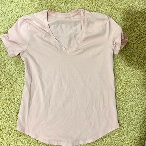 I am selling a Lululemon light pink T-shirt only worn once